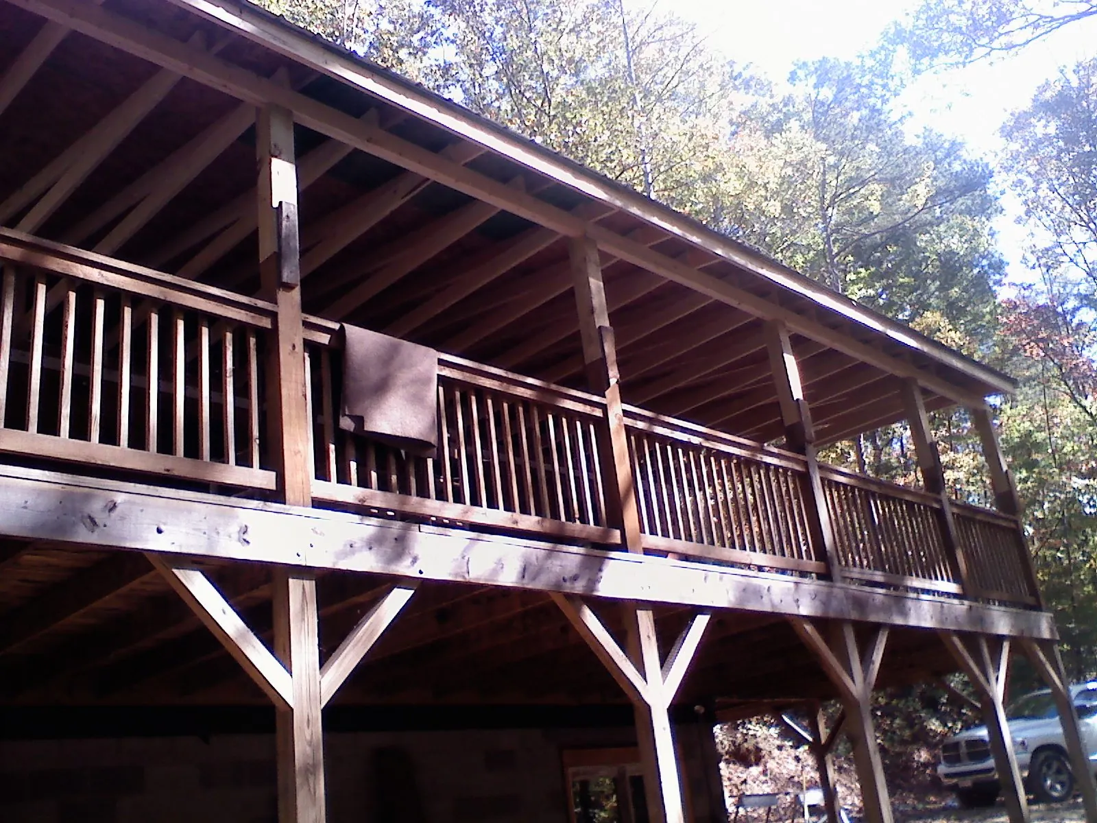 Timber framing under a new elevated porch and deck — Roof Leak Repair in Harrisonville by Roofing Brothers